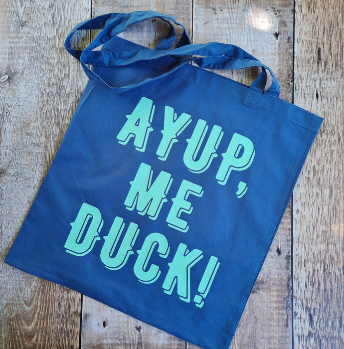 Ay up me duck! capital letters Tote Bag