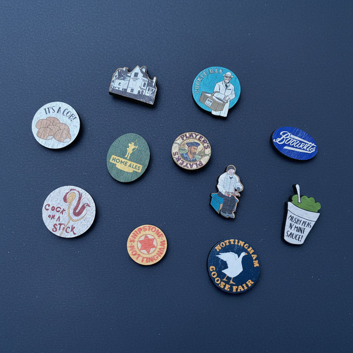 Player's wooden lapel pin