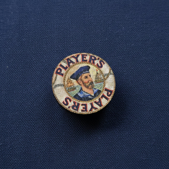 Player's wooden lapel pin